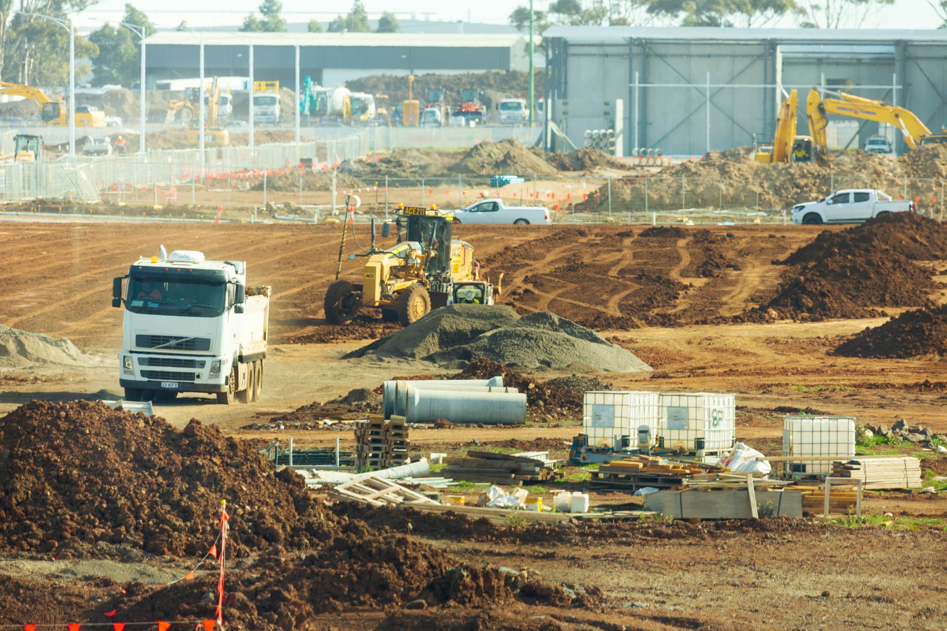 white and brown heavy equipment